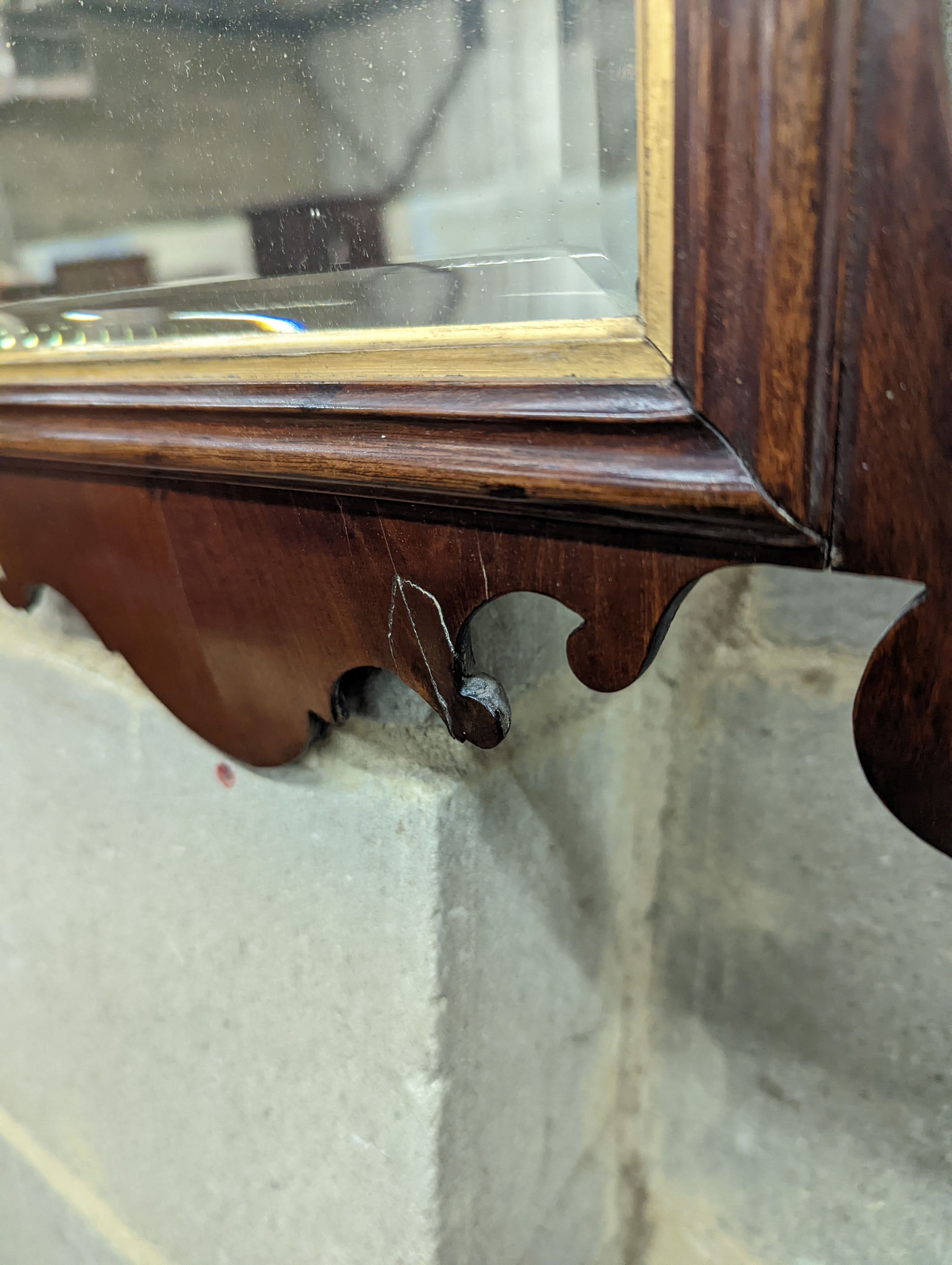 A George III mahogany fret frame wall mirror, height 63cm, width 39cm
